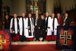 At the ‘Out of The Fire’ Festival Opening Service in Lisburn Cathedral are L to R: Mr Graeme Clarke (Rector’s Warden), Rev Canon Percival Walker (Precentor), Rev Ken McGrath (Lisburn Cathedral Vicar), The Very Rev John Bond (Dean of Connor), Councillor James Tinsley (Lisburn Mayor), Mrs Margaret Tinsley (Lisburn Mayoress), Rev Canon Sam Wright (Lisburn Cathedral Rector), Rev Canon William Bell (Eglantine Parish Rector), Mr Alan Whyte (Dean’s Verger) and Mr John Humes (People’s Warden).